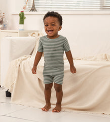 AVAUMA Flutter Short Sleeve Set Olive Green Stripe Pattern The passage emphasizes the breathability of the pajamas, making them perfect for keeping cool and comfortable, especially on hot days. The fabric is designed to provide a refreshing and airy feel, ensuring that children stay comfortable even in hot weather.