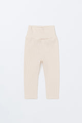 Flat lay of Avauma Aileen Baby Leggings in Butter Cream, soft ribbed baby leggings with high-waist design for extra comfort. Flat lay of Avauma Aileen Baby Leggings in Butter Cream, soft ribbed baby leggings with high-waist design for extra comfort.