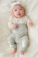 Baby wearing Avauma Aileen Baby Leggings - Powder Mint, cozy high-waist leggings, stretchy baby pants Baby wearing Avauma Aileen Baby Leggings - Powder Mint, cozy high-waist leggings, stretchy baby pants