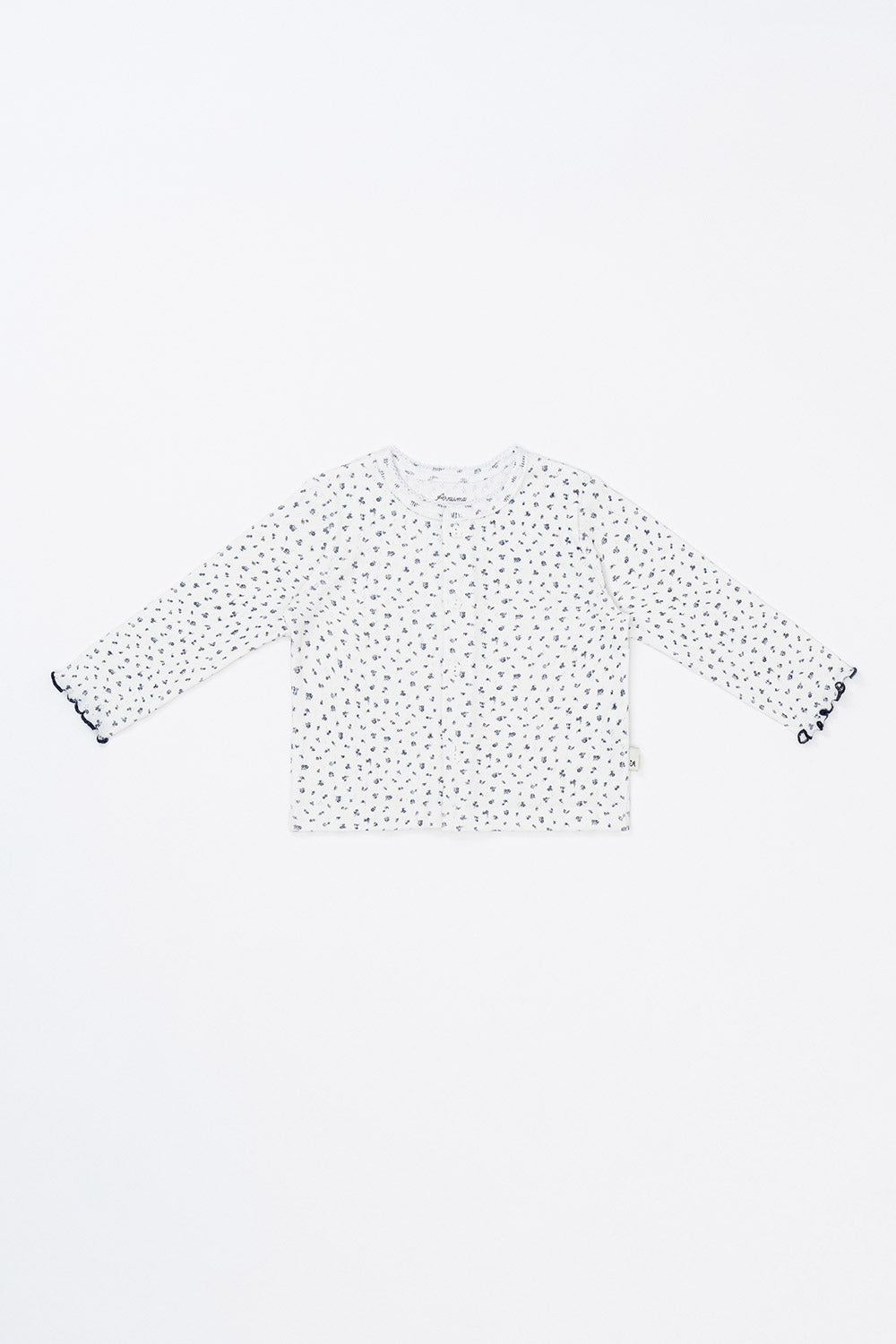 Avauma Aileen Bloom Cardigan in Lunabel Navy – a charming baby cardigan with delicate navy floral patterns, perfect for layering in all seasons. Avauma Aileen Bloom Cardigan in Lunabel Navy – a charming baby cardigan with delicate navy floral patterns, perfect for layering in all seasons.