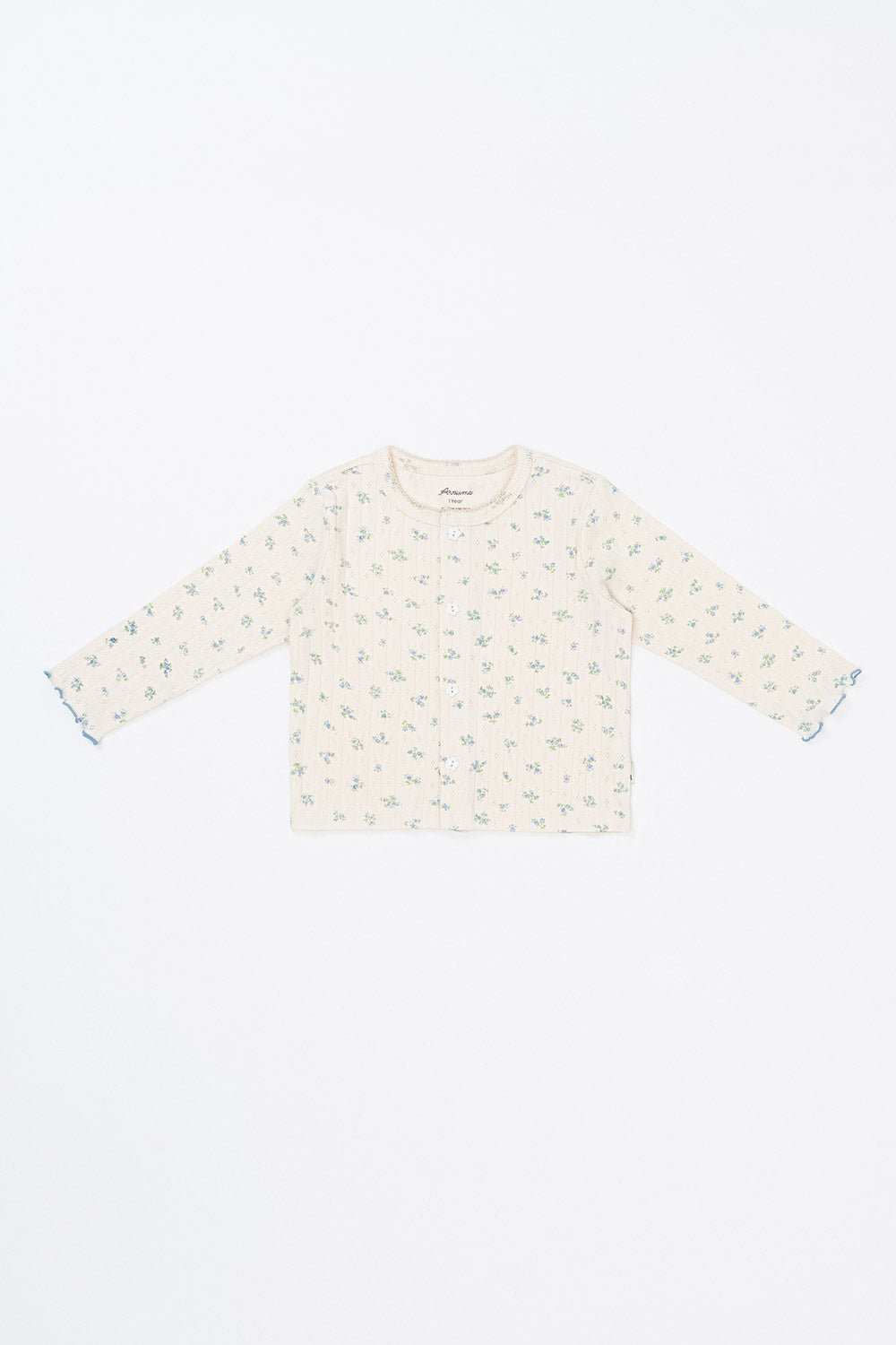 Flat lay of Avauma Aileen Bloom Cardigan in Milk Flower, lightweight baby cardigan with floral print, ideal for layering. Flat lay of Avauma Aileen Bloom Cardigan in Milk Flower, lightweight baby cardigan with floral print, ideal for layering.