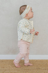 Baby wearing Avauma Aileen Bloom Cardigan with bear ear headband, cute and comfortable floral knit cardigan for infants. Baby wearing Avauma Aileen Bloom Cardigan with bear ear headband, cute and comfortable floral knit cardigan for infants.
