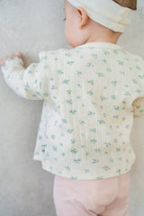Back view of Avauma Aileen Bloom Cardigan, soft cotton ribbed fabric with delicate floral print, breathable and lightweight. Back view of Avauma Aileen Bloom Cardigan, soft cotton ribbed fabric with delicate floral print, breathable and lightweight.