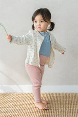 Baby girl wearing Avauma Aileen Bloom Cardigan in Milk Flower, soft floral baby cardigan with lace details, perfect for spring outfit. Baby girl wearing Avauma Aileen Bloom Cardigan in Milk Flower, soft floral baby cardigan with lace details, perfect for spring outfit.