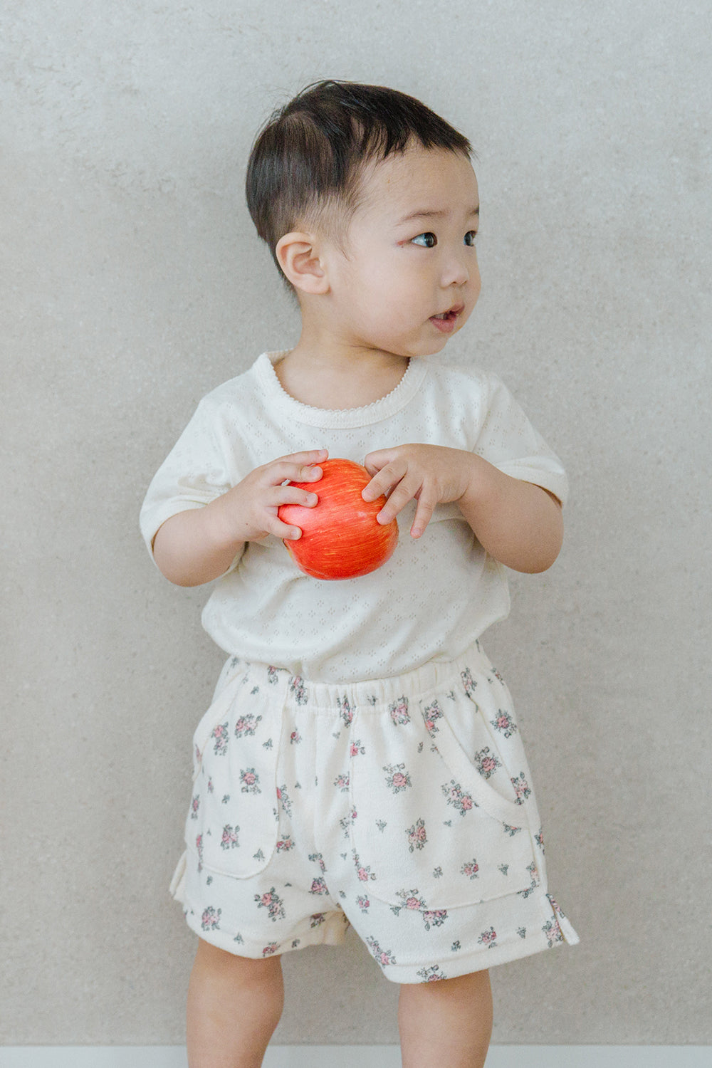 Baby Boy Standing in Avauma Fluffy Garden Cream Rose Shorts, Soft Elastic Waistband for Comfortable Fit
 Baby Boy Standing in Avauma Fluffy Garden Cream Rose Shorts, Soft Elastic Waistband for Comfortable Fit