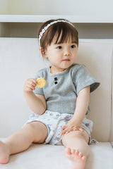 Toddler Sitting Comfortably in Avauma Fluffy Garden Melange Berry Baby Shorts, Cozy and Stylish Outfit
Toddler Sitting Comfortably in Avauma Fluffy Garden Melange Berry Baby Shorts, Cozy and Stylish Outfit