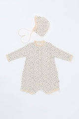 Front view of the Lumiere Bodysuit in Olive Rose – a long-sleeve baby romper with a subtle floral print and lace accents. Front view of the Lumiere Bodysuit in Olive Rose – a long-sleeve baby romper with a subtle floral print and lace accents.