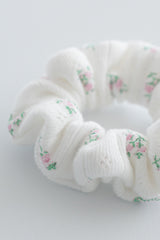 Close-up of blossom pink scrunchie with pink rose accents – Avauma
Close-up of blossom pink scrunchie with pink rose accents – Avauma