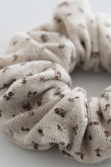 Close-up of maple oat floral scrunchie in soft ribbed fabric – Avauma
Close-up of maple oat floral scrunchie in soft ribbed fabric – Avauma