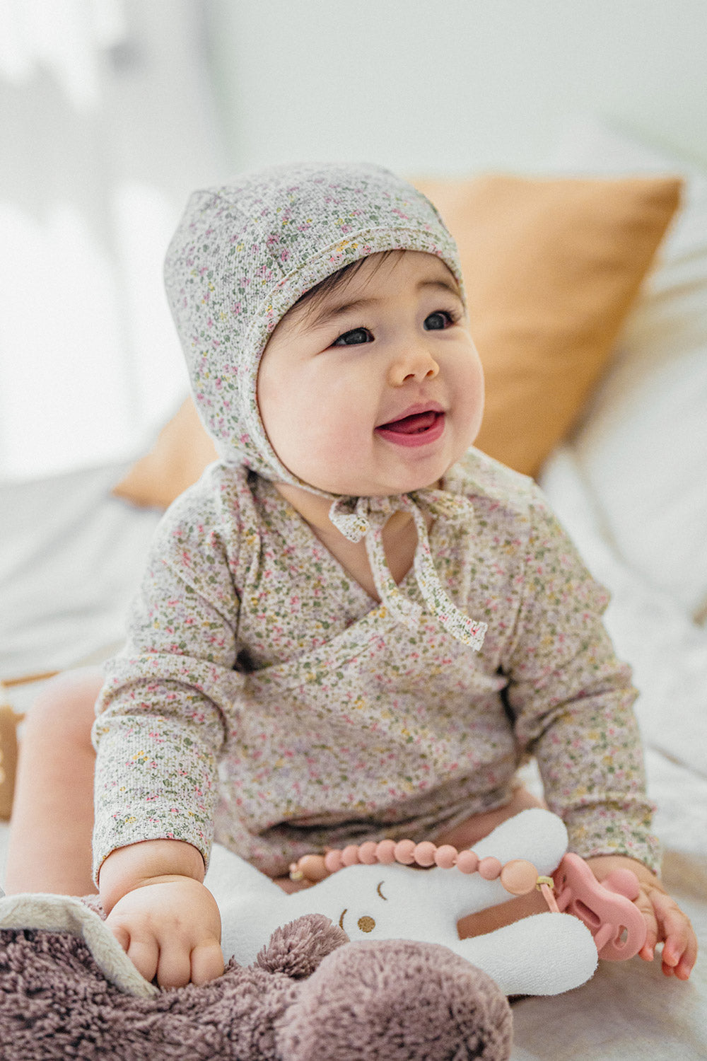 Selina Babysuit Iris artistic angle view – a creative perspective highlighting the elegant design and comfortable fit for newborns Selina Babysuit Iris artistic angle view – a creative perspective highlighting the elegant design and comfortable fit for newborns