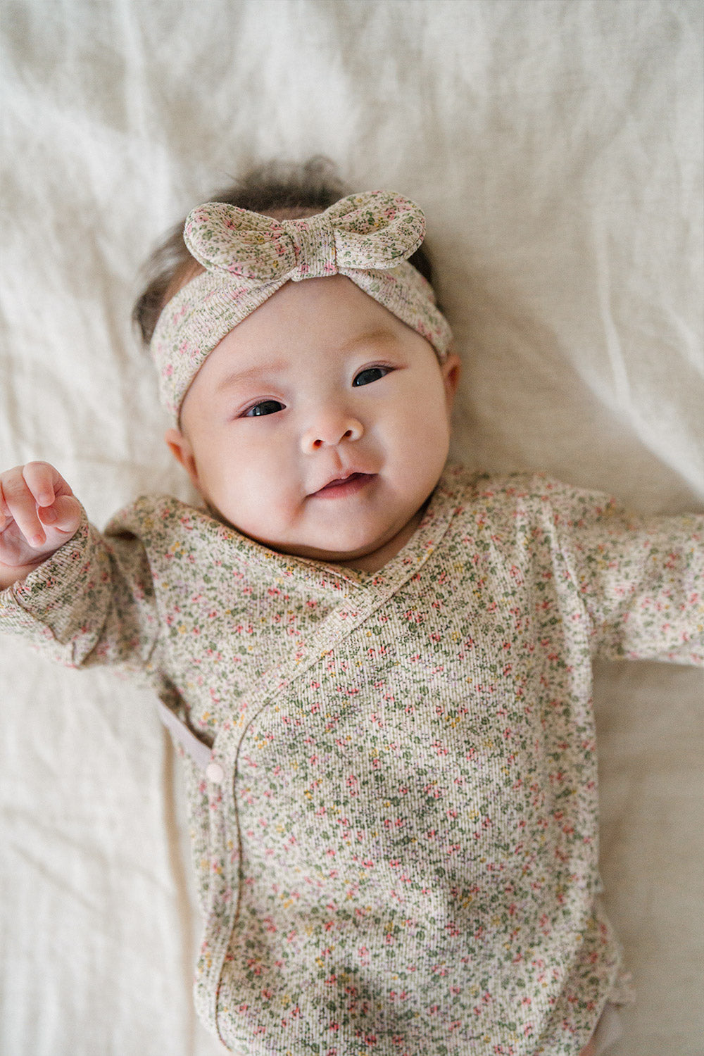 Selina Babysuit Iris full outfit display – a complete look combining style and practicality in an iris-toned bodysuit for active newborns  Selina Babysuit Iris full outfit display – a complete look combining style and practicality in an iris-toned bodysuit for active newborns