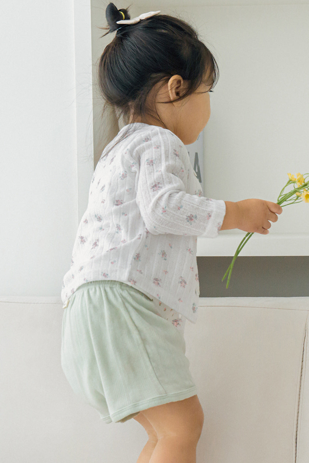Toddler walking in Avauma garden sage tank set – floral top and green shorts daily outfit
Toddler walking in Avauma garden sage tank set – floral top and green shorts daily outfit