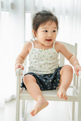Baby wearing Avauma blue mint garden top with navy shorts – playful floral summer outfit
Baby wearing Avauma blue mint garden top with navy shorts – playful floral summer outfit