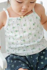 Close-up of Avauma blue mint garden sleeveless top – soft fabric with delicate floral detail
Close-up of Avauma blue mint garden sleeveless top – soft fabric with delicate floral detail