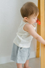 Toddler boy in Avauma pure vanilla sleeveless top and light gray shorts – casual summer look
Toddler boy in Avauma pure vanilla sleeveless top and light gray shorts – casual summer look