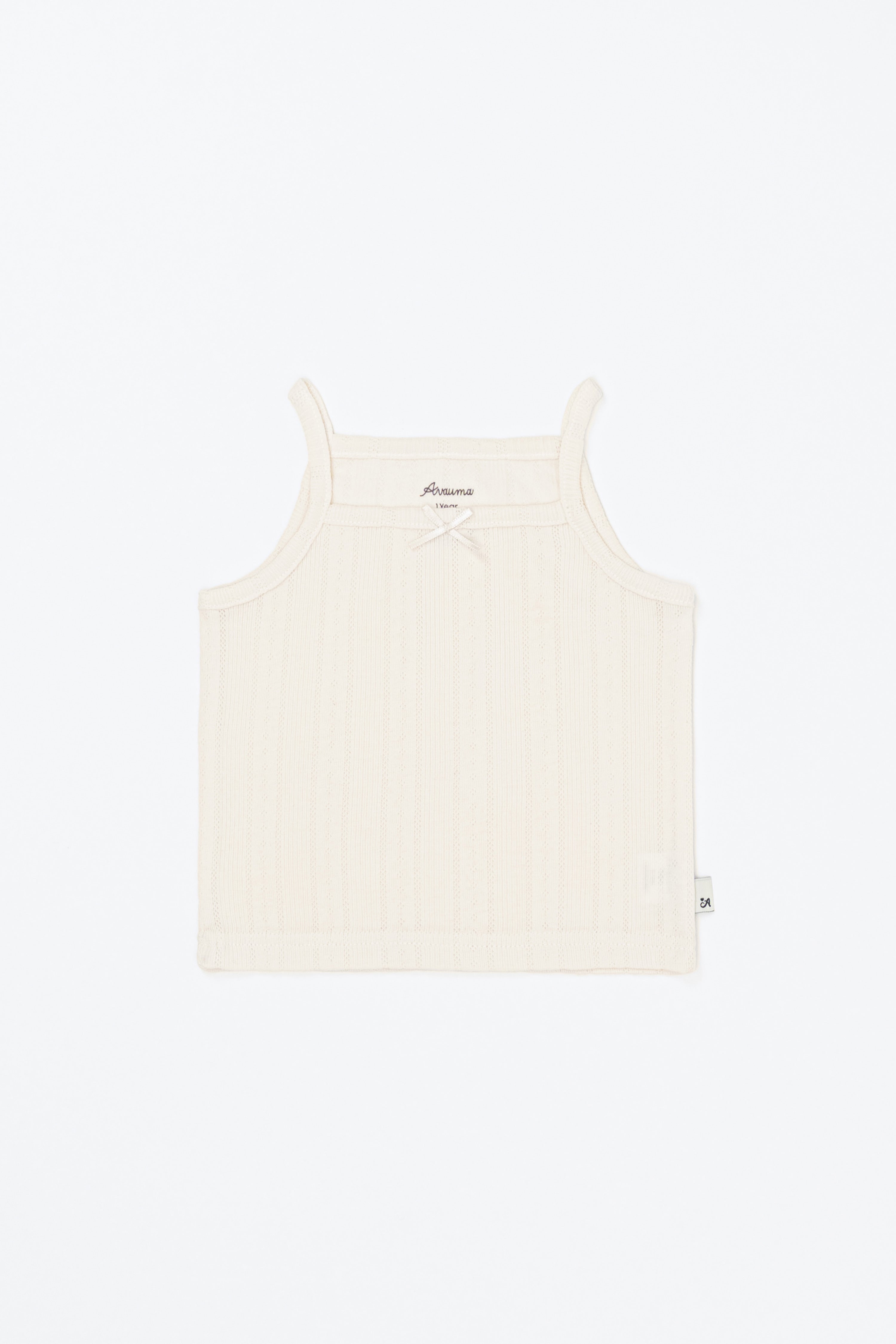 Flat lay of Avauma pure vanilla sleeveless top – soft texture with breathable knit pattern
Flat lay of Avauma pure vanilla sleeveless top – soft texture with breathable knit pattern
