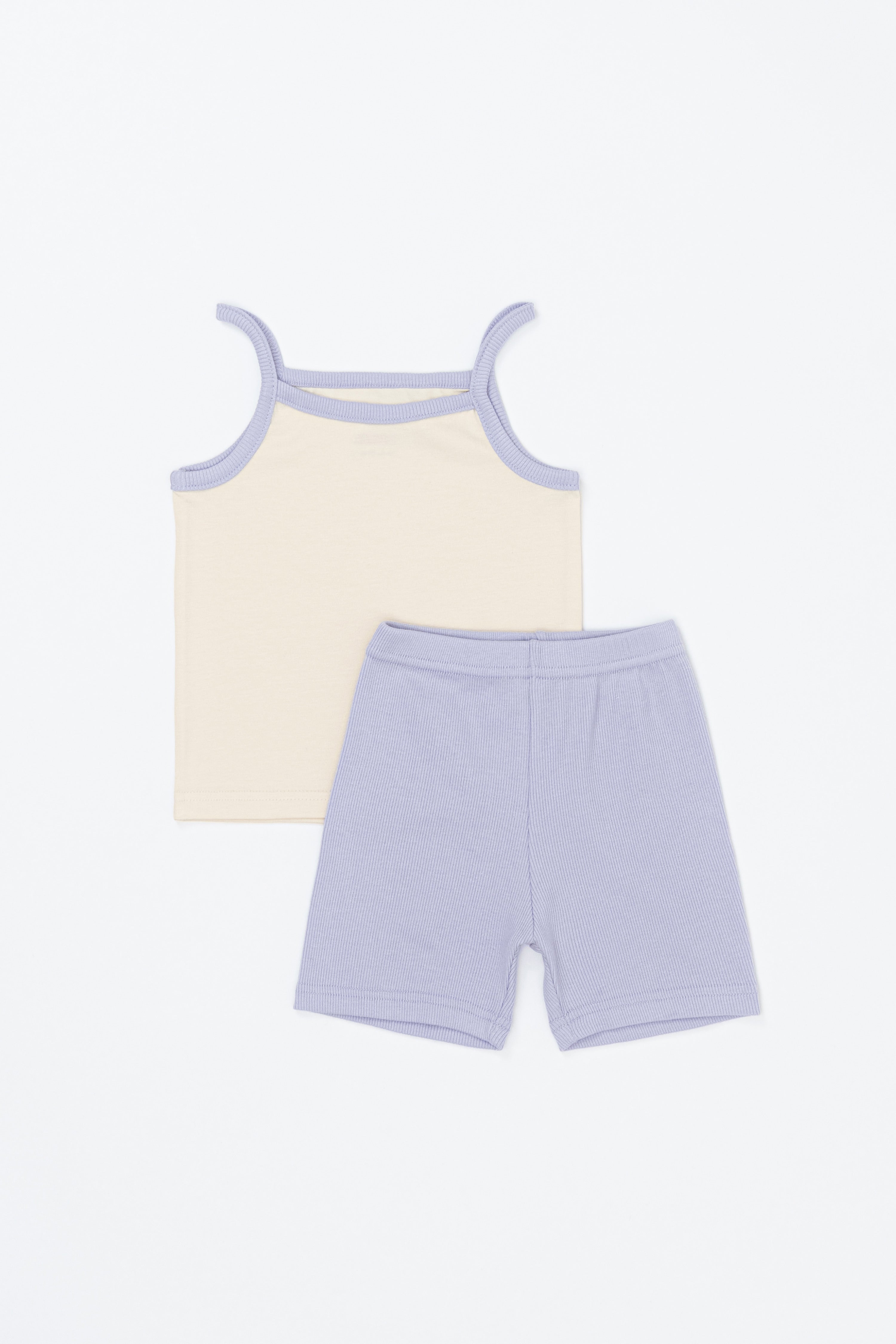 AVAUMA Laila Day baby sleeveless top and shorts set in lilac cream color, flat lay product image AVAUMA Laila Day baby sleeveless top and shorts set in lilac cream color, flat lay product image
