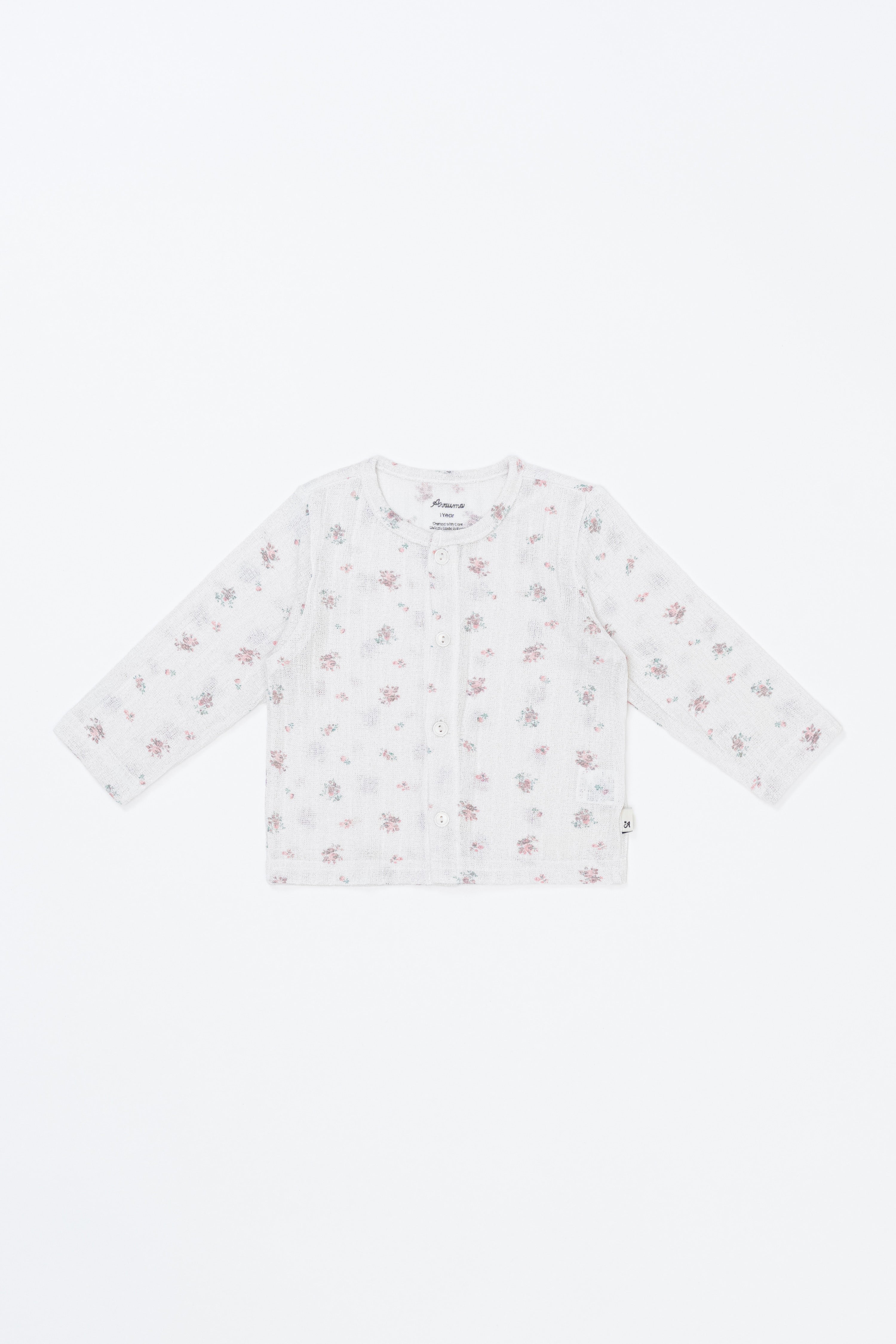 avauma Little Shell Cardigan – Rosy Cream Flower print laid flat, soft baby knitwear with floral pattern. avauma Little Shell Cardigan – Rosy Cream Flower print laid flat, soft baby knitwear with floral pattern.