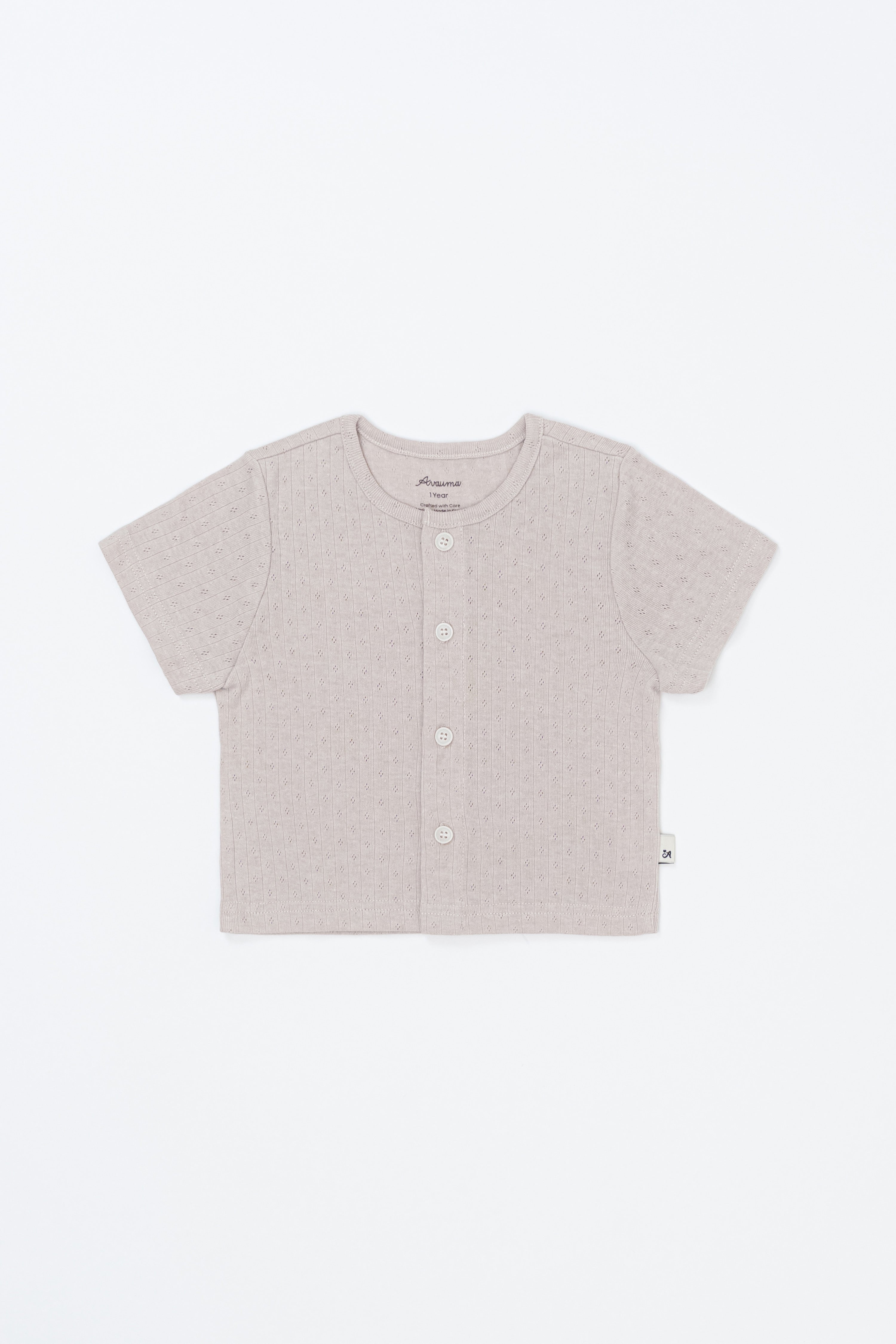 Lucent Short Sleeve Cardigan product shot. Ivory infant summer short-sleeve cardigan laid flat on a clean, light background Lucent Short Sleeve Cardigan product shot. Ivory infant summer short-sleeve cardigan laid flat on a clean, light background