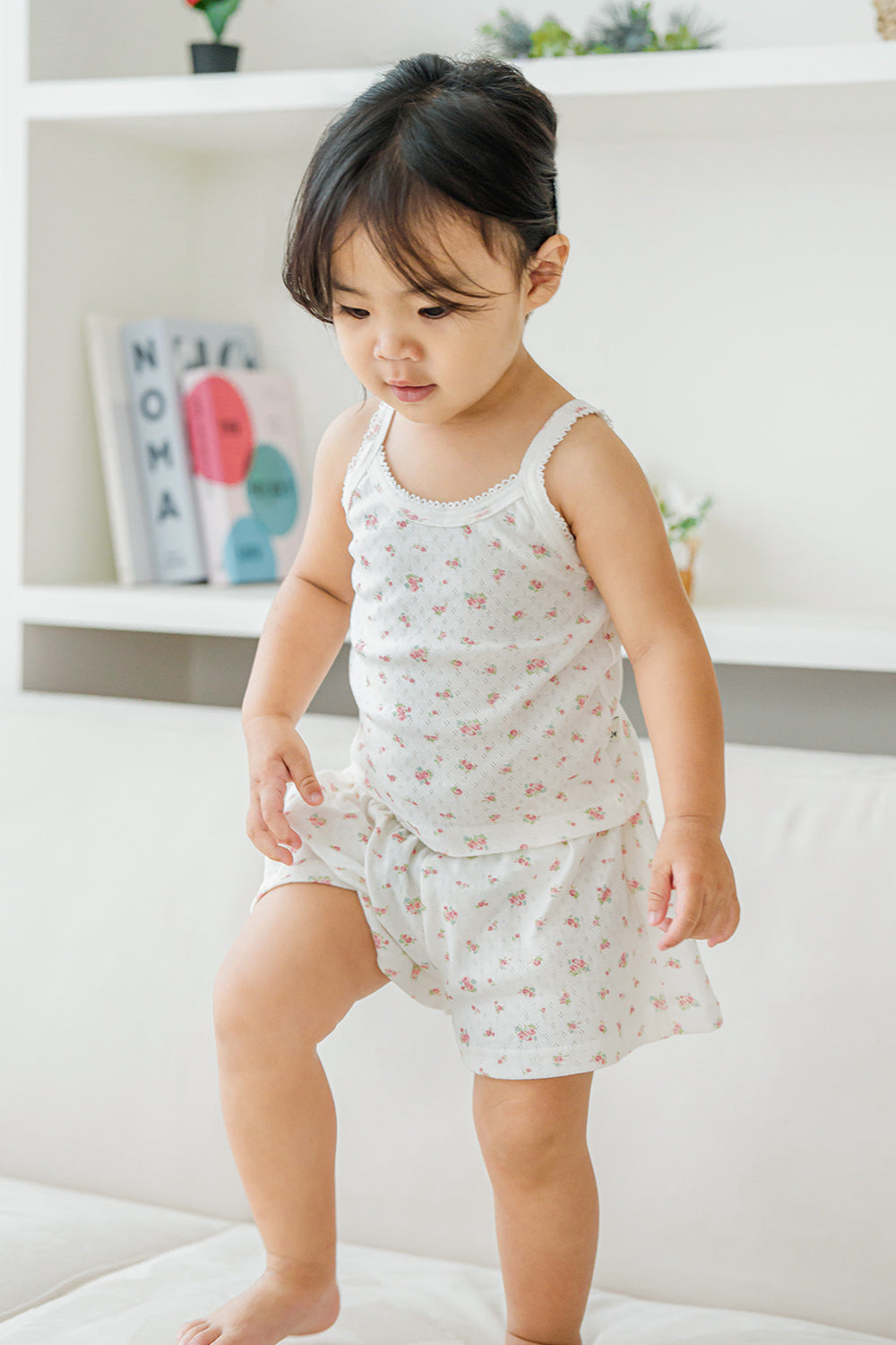 Toddler stepping down in Avauma rose belle tank top and shorts
 Toddler stepping down in Avauma rose belle tank top and shorts