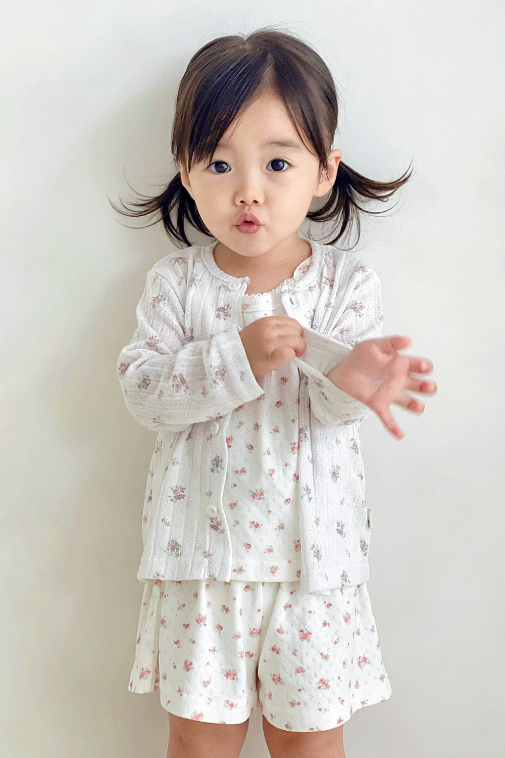 Avauma rose belle picnic tank top set worn with a soft cardigan by toddler girl Avauma rose belle picnic tank top set worn with a soft cardigan by toddler girl