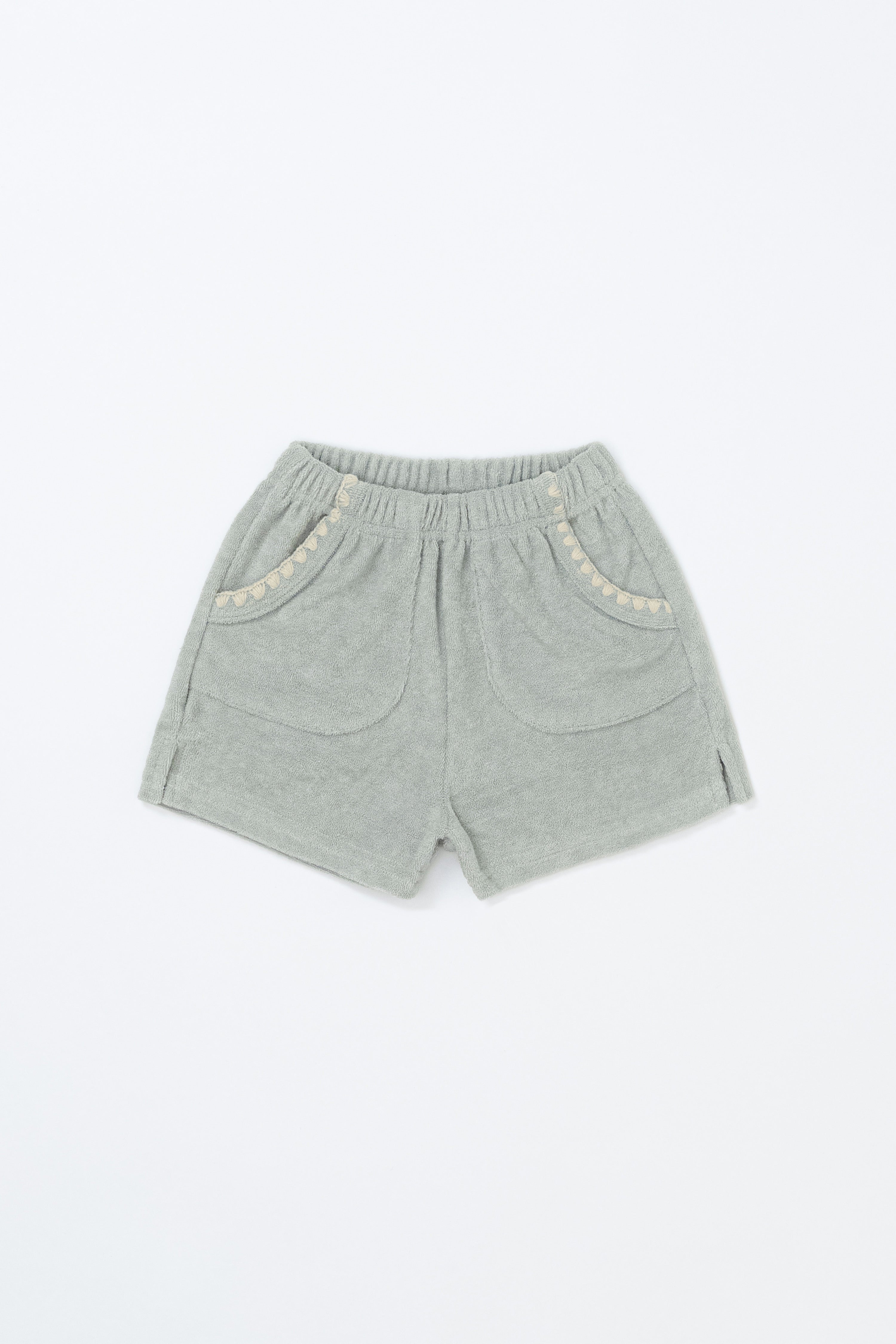 Avauma Pocket Day Shorts in Green Tea Milk – soft green toddler shorts with elastic waistband and scallop pockets on white background
Avauma Pocket Day Shorts in Green Tea Milk – soft green toddler shorts with elastic waistband and scallop pockets on white background