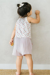 Toddler in Avauma Milk Pink Pocket Shorts standing with back to camera, leaning against wall
Toddler in Avauma Milk Pink Pocket Shorts standing with back to camera, leaning against wall
