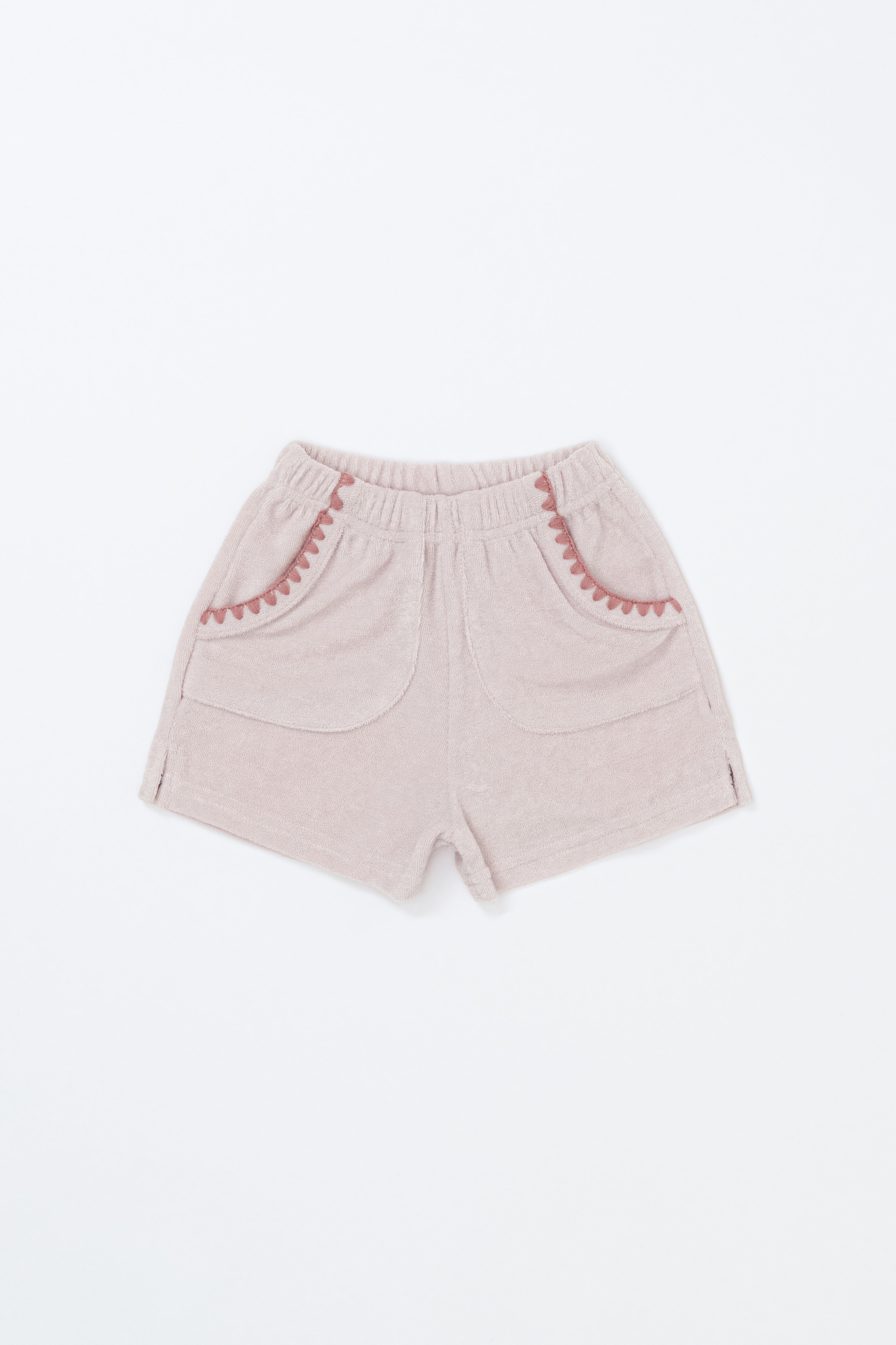 Avauma Pocket Day Shorts in Milk Pink – baby shorts with scallop trim and elastic waistband on white background
Avauma Pocket Day Shorts in Milk Pink – baby shorts with scallop trim and elastic waistband on white background