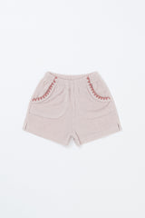 Avauma Pocket Day Shorts in Milk Pink – baby shorts with scallop trim and elastic waistband on white background
Avauma Pocket Day Shorts in Milk Pink – baby shorts with scallop trim and elastic waistband on white background