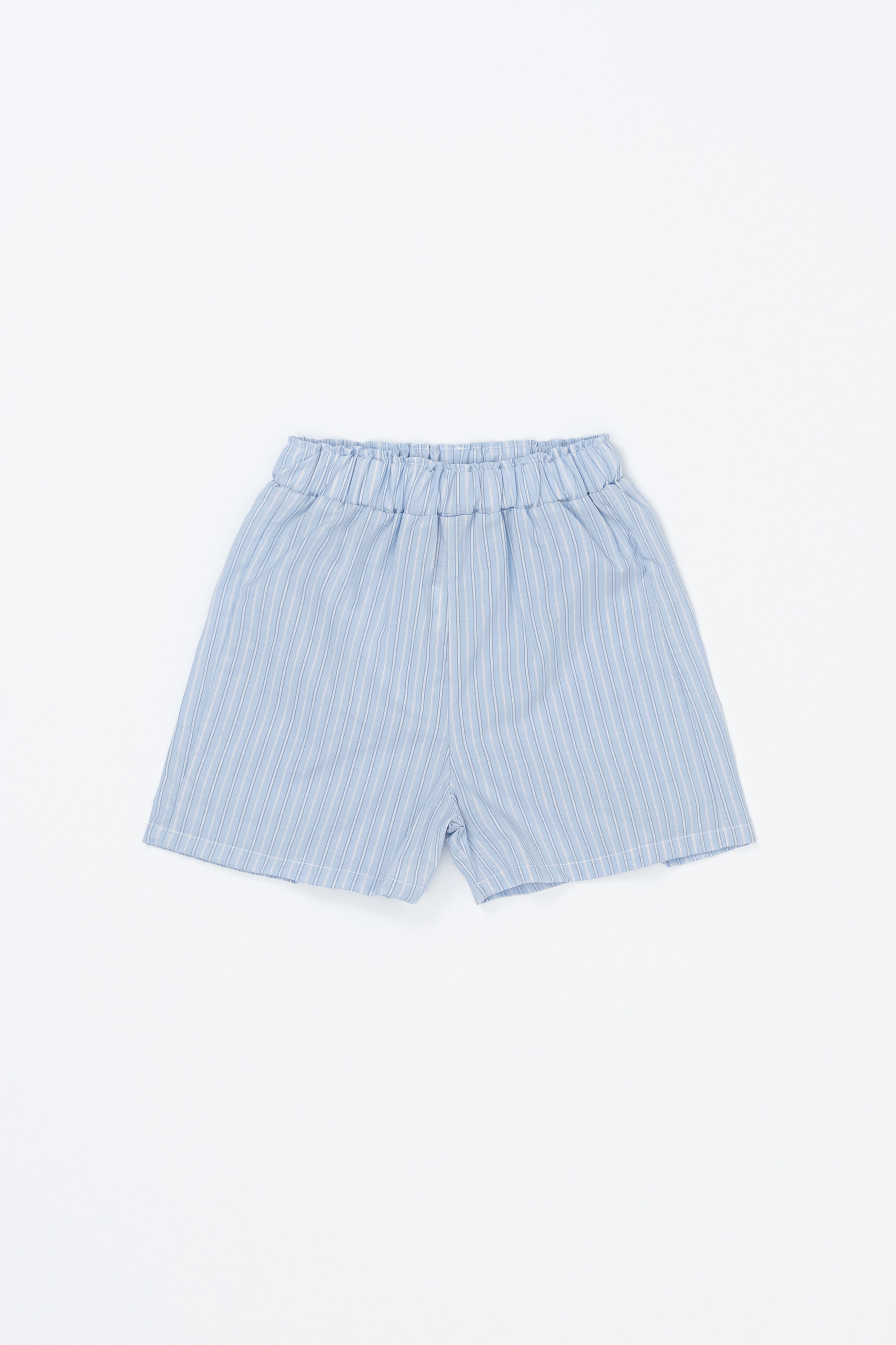 Avauma Sunny Stripe Pants Blueberry Powder product shot. Lay-flat of light blue striped baby shorts on a white background. Avauma Sunny Stripe Pants Blueberry Powder product shot. Lay-flat of light blue striped baby shorts on a white background.