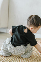 Infant crawling in Avauma Breeze Jogger Pants, vintage check pattern with comfy elastic waist. Infant crawling in Avauma Breeze Jogger Pants, vintage check pattern with comfy elastic waist.