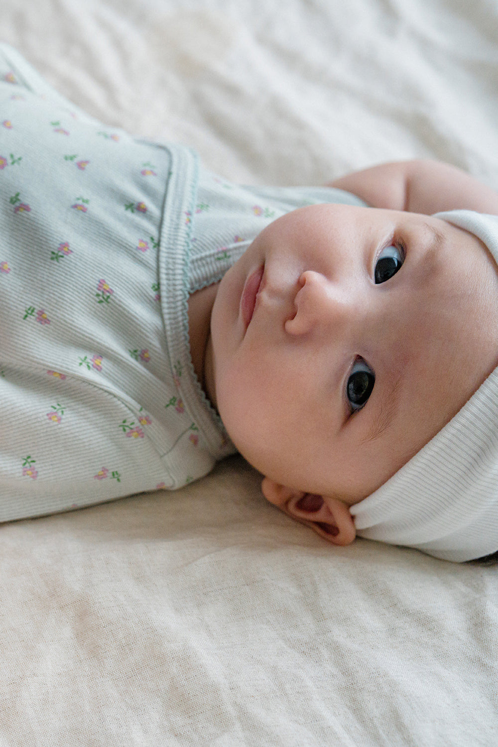 Baby in Avauma Clare Mint Rose Wrap Bodysuit, Short Sleeve Babywear with Delicate Floral Pattern
Baby in Avauma Clare Mint Rose Wrap Bodysuit, Short Sleeve Babywear with Delicate Floral Pattern