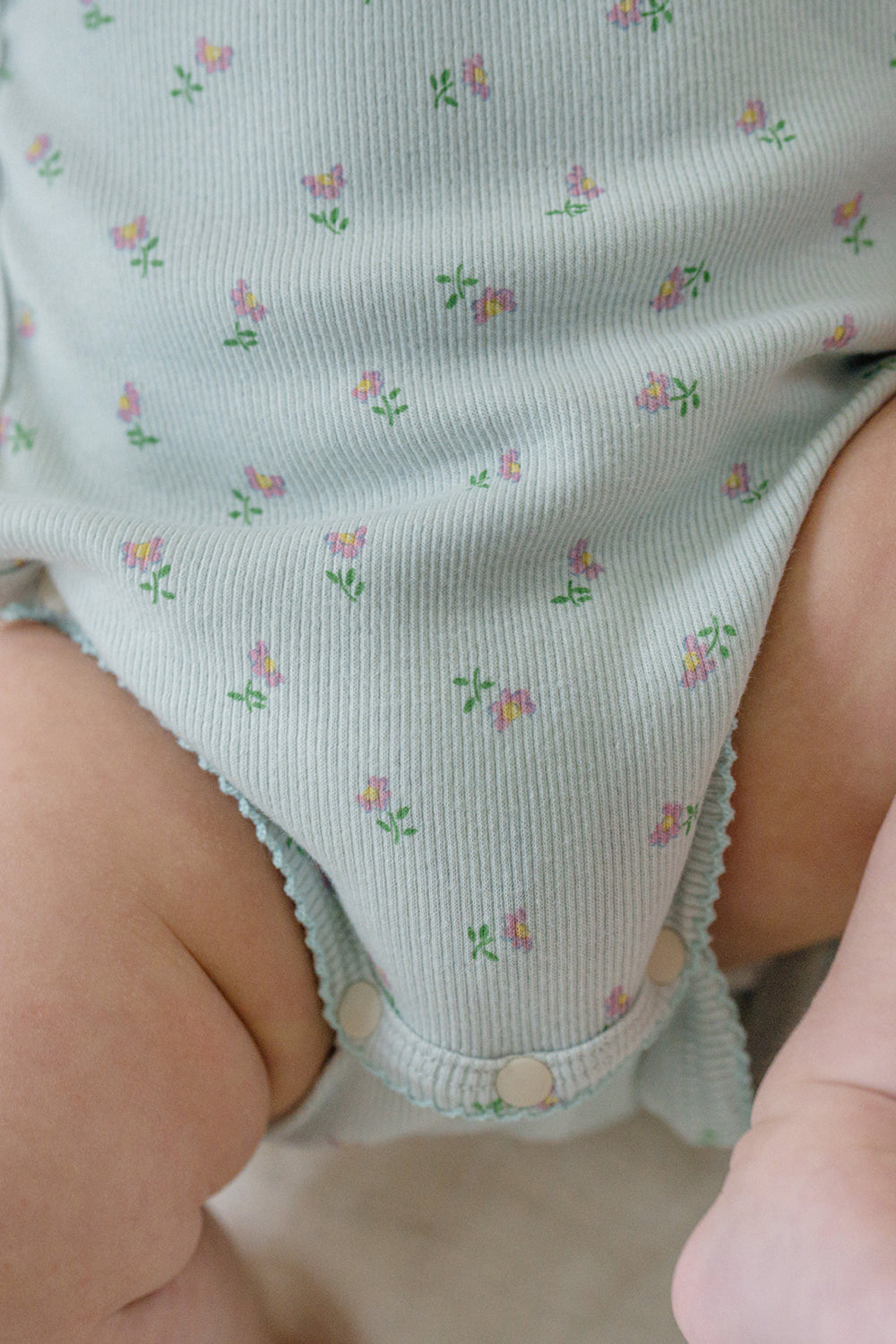 Bottom View of Avauma Clare Mint Rose Short Sleeve Baby Bodysuit with Snap Closures, Mint Floral Pattern
Bottom View of Avauma Clare Mint Rose Short Sleeve Baby Bodysuit with Snap Closures, Mint Floral Pattern