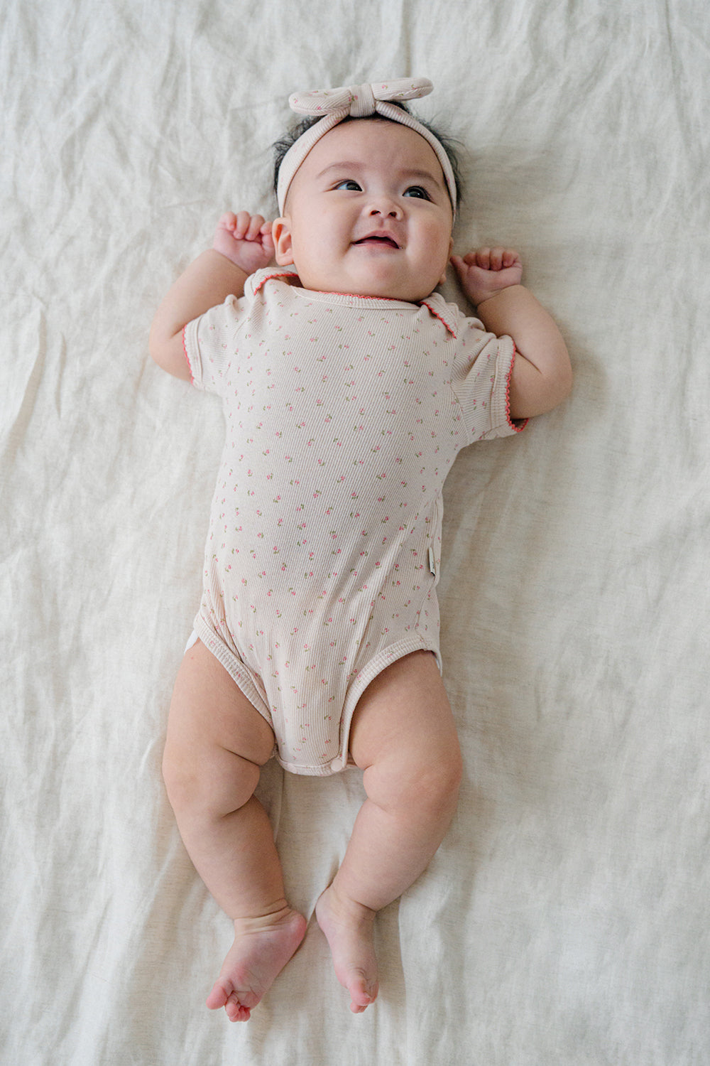 Baby Smiling in Avauma Clare Peach Cream Short Sleeve Bodysuit, Lightweight and Breathable Summer Onesie
Baby Smiling in Avauma Clare Peach Cream Short Sleeve Bodysuit, Lightweight and Breathable Summer Onesie