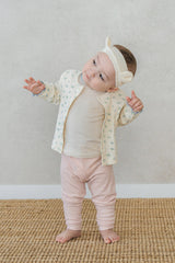 Layered baby girl outfit with Avauma Vanilla Sky pajama set – soft ribbed sleepwear look  Layered baby girl outfit with Avauma Vanilla Sky pajama set – soft ribbed sleepwear look