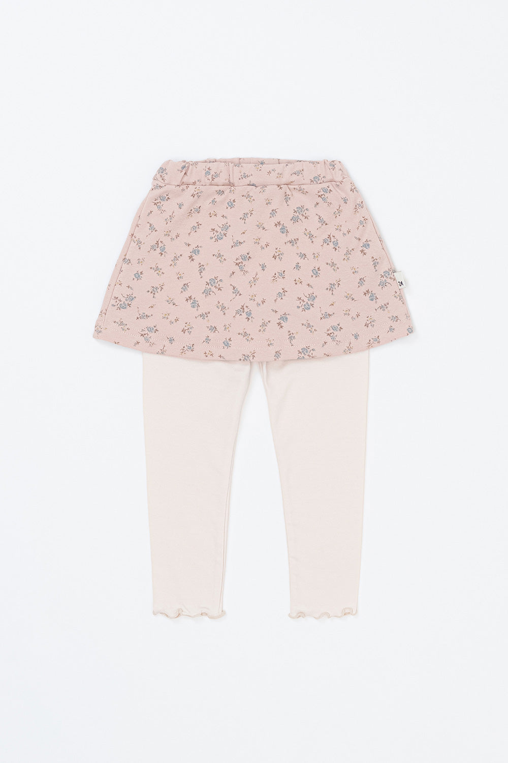 Avauma flower skirt leggings in cream pink laid flat on white background, featuring tiny floral print and soft elastic waistband  Avauma flower skirt leggings in cream pink laid flat on white background, featuring tiny floral print and soft elastic waistband