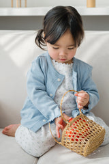 Toddler girl in Avauma Skybloom heart knit cardigan, soft baby clothes for playtime or everyday wear Toddler girl in Avauma Skybloom heart knit cardigan, soft baby clothes for playtime or everyday wear