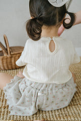 Back View of Toddler Wearing Avauma Le Petite White Oat Short Sleeve T-Shirt, Paired with Frill Skirt
Back View of Toddler Wearing Avauma Le Petite White Oat Short Sleeve T-Shirt, Paired with Frill Skirt