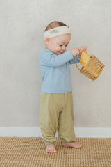Toddler in Avauma Cloud Blue jogger outfit – pastel-colored cotton baby clothes
 Toddler in Avauma Cloud Blue jogger outfit – pastel-colored cotton baby clothes