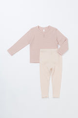 Front view of the Avauma Peach Glow Set in Pale Peach – a cute children’s outfit featuring a textured knit top and ribbed leggings Front view of the Avauma Peach Glow Set in Pale Peach – a cute children’s outfit featuring a textured knit top and ribbed leggings