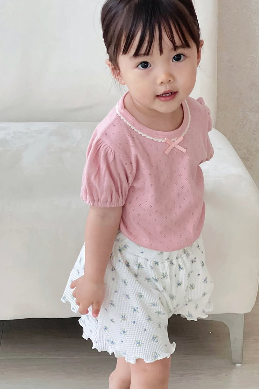 Baby Girl Standing in Avauma Petit Bloom Blooming White Shorts, Comfortable Fit Elastic Waist Shorts
Baby Girl Standing in Avauma Petit Bloom Blooming White Shorts, Comfortable Fit Elastic Waist Shorts