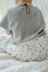 Back Detail of Toddler in Avauma Petit Bloom Blooming White Shorts, Elastic Waist Ribbed Shorts with Small Flowers
Back Detail of Toddler in Avauma Petit Bloom Blooming White Shorts, Elastic Waist Ribbed Shorts with Small Flowers