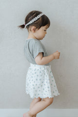 Side View of Toddler Wearing Avauma Petit Bloom Blooming White Baby Shorts, Lightweight Cotton Shorts
Side View of Toddler Wearing Avauma Petit Bloom Blooming White Baby Shorts, Lightweight Cotton Shorts