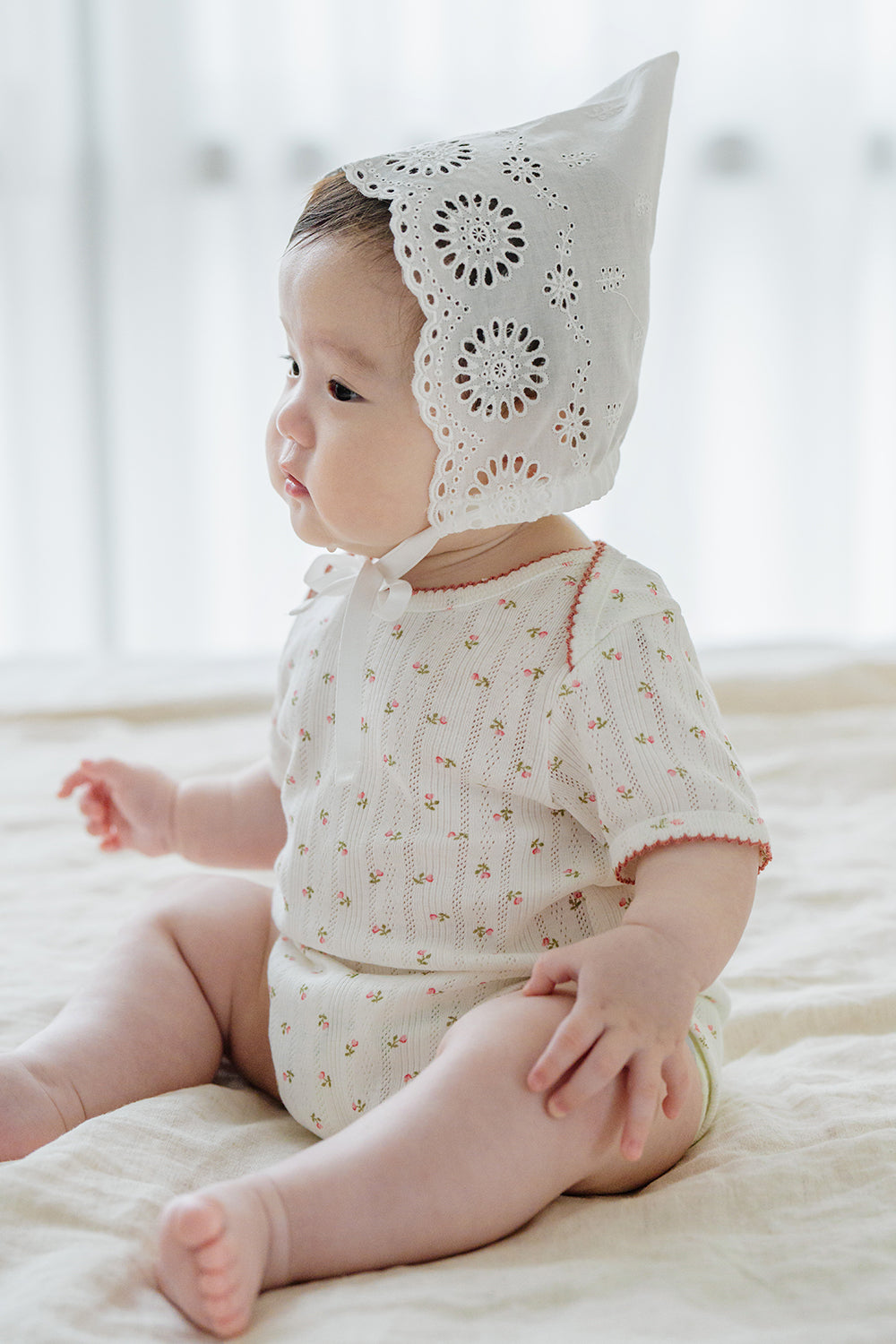 Baby Sitting in Avauma Petite Garden Rosegarden Short Sleeve Bodysuit, Soft Beige Base with Rose Pattern
Baby Sitting in Avauma Petite Garden Rosegarden Short Sleeve Bodysuit, Soft Beige Base with Rose Pattern