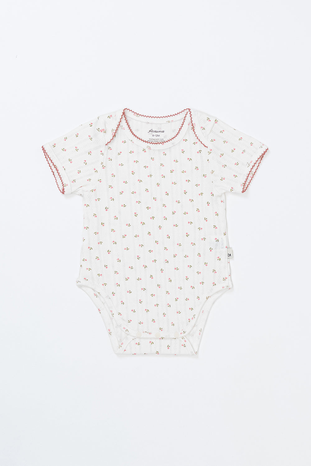 Flat Lay of Avauma Petite Garden Rosegarden Short Sleeve Baby Bodysuit, Ribbed Cotton Onesie with Pink Floral Print
Flat Lay of Avauma Petite Garden Rosegarden Short Sleeve Baby Bodysuit, Ribbed Cotton Onesie with Pink Floral Print