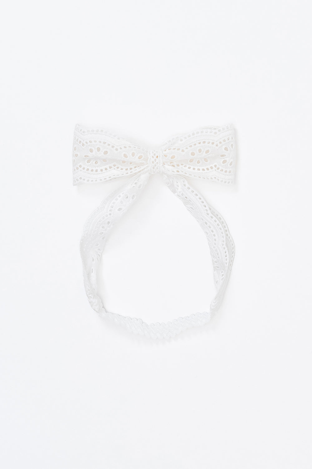 Avauma Rumiere Ribbon Band - Cotton Cream laid flat on a white background, showing full lace bow Avauma Rumiere Ribbon Band - Cotton Cream laid flat on a white background, showing full lace bow