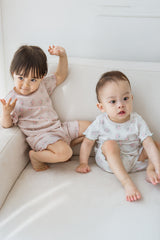 Two babies in Sienna Rose short sleeve sets, Creamy Buquet and Pink Buquet, playful and stylish summer matching outfits Two babies in Sienna Rose short sleeve sets, Creamy Buquet and Pink Buquet, playful and stylish summer matching outfits