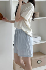 Side view of Avauma blueberry powder striped cotton mom shorts.
Side view of Avauma blueberry powder striped cotton mom shorts.