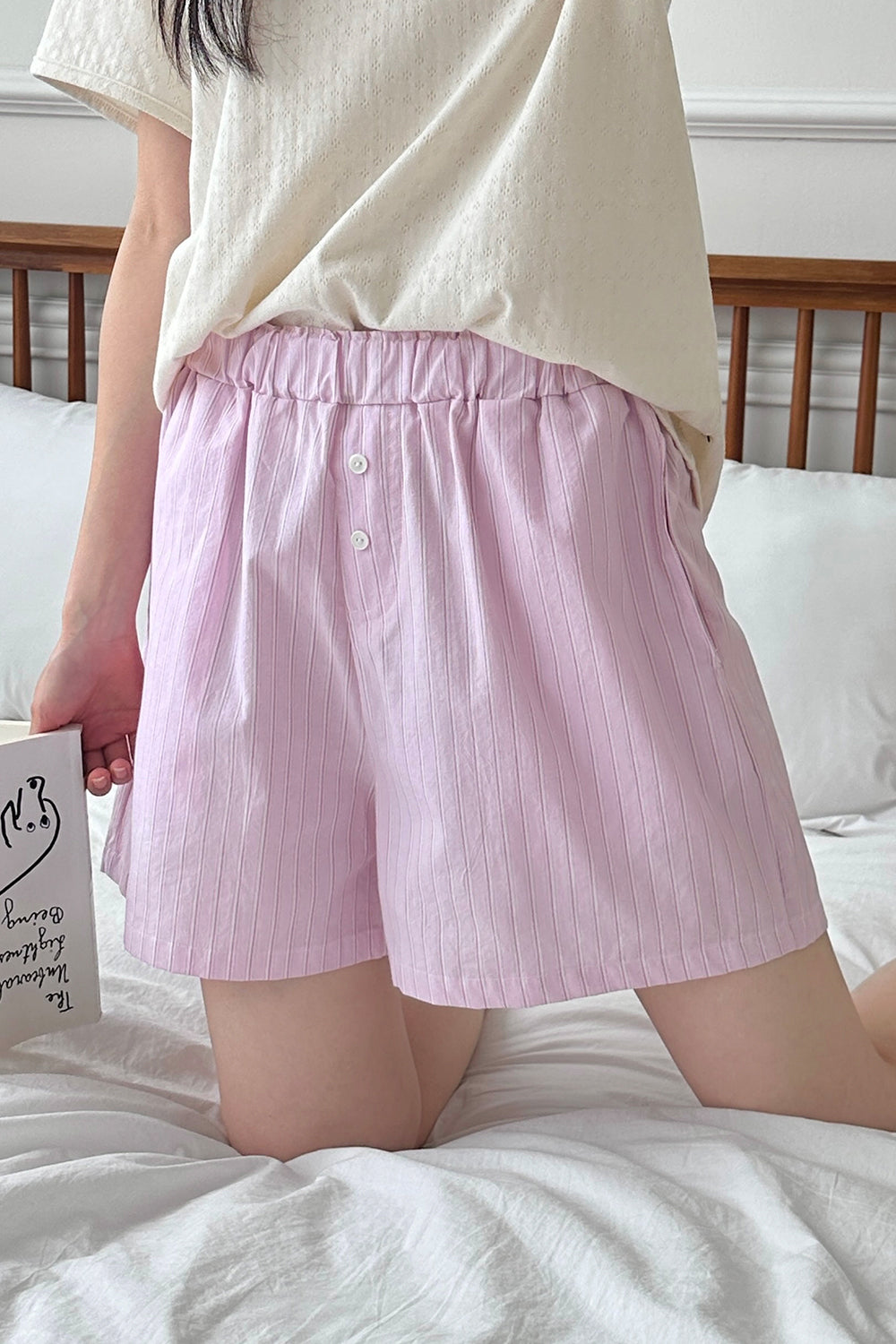 Side view of Avauma Sunny Stripe mom shorts in lotus pink, comfy and breezy fit.
Side view of Avauma Sunny Stripe mom shorts in lotus pink, comfy and breezy fit.
