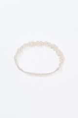 Avauma White Garden Band headband in Cream Beige with delicate bow embroidery, displayed flat on white background Avauma White Garden Band headband in Cream Beige with delicate bow embroidery, displayed flat on white background